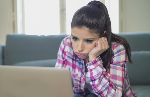 Woman Looking Bored On Slow Day For Markets